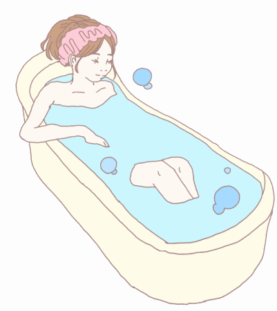 お風呂に肩までつかって温まる女性のイメージ